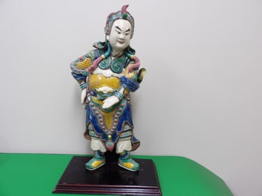 Chinese large roof tile of a standing warrior sculpture on wooden base