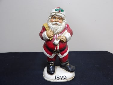 cast metal Santa Claus figural doorstop marked 1872