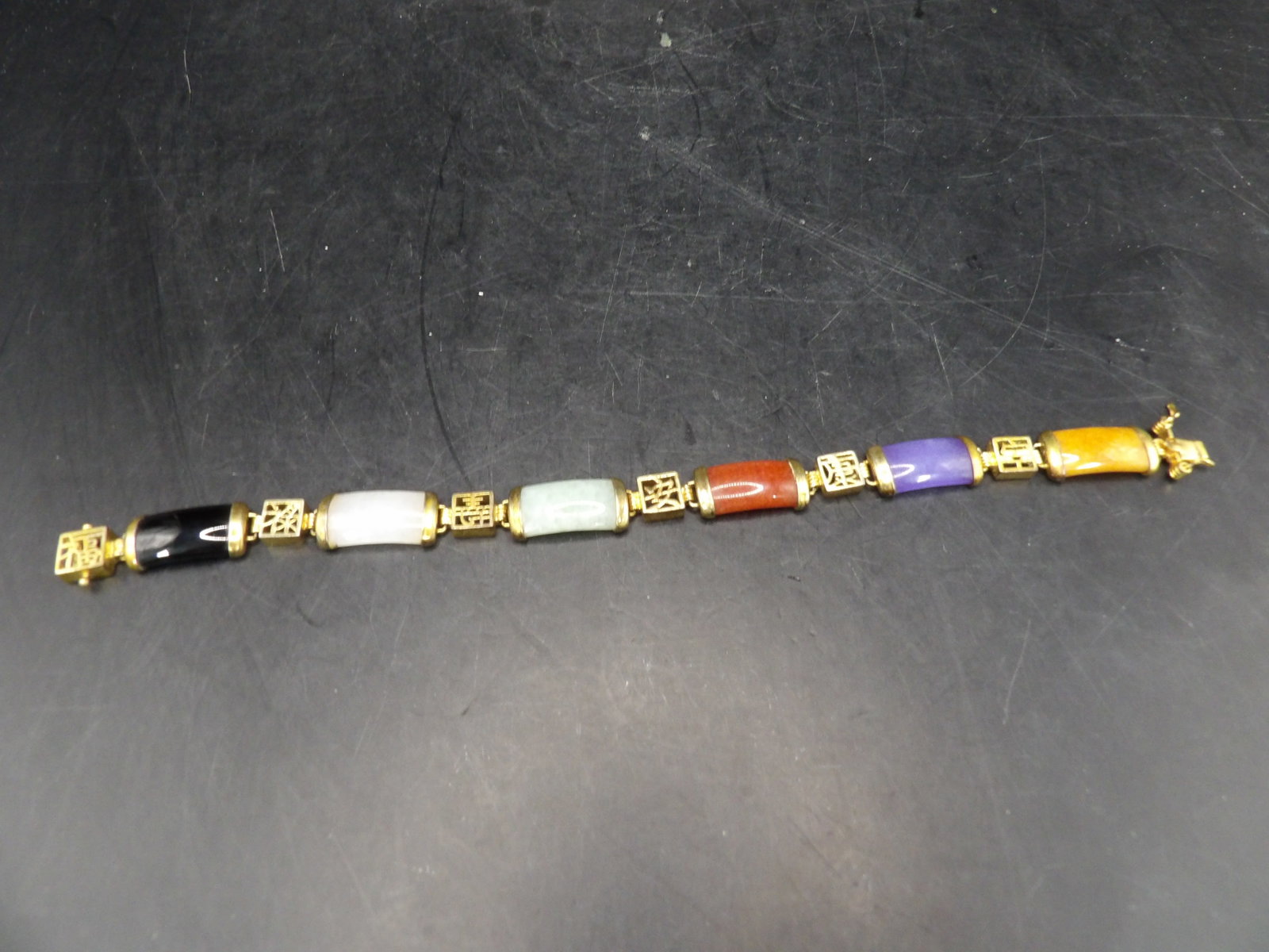 Chinese multiple colors jade bracelet with Chinese characters links: 7.5 inches length.