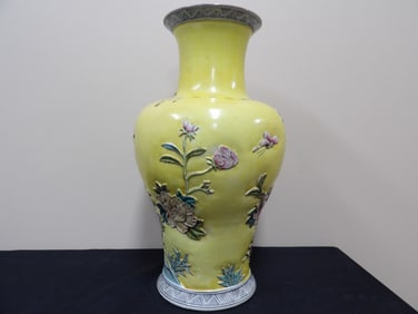 Chinese yellow background porcelain vase with Qing dynasty Qianlong mark and raised motif