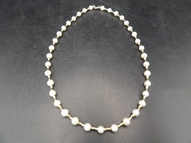 14k gold connecting bar and pearl necklace marked 14k