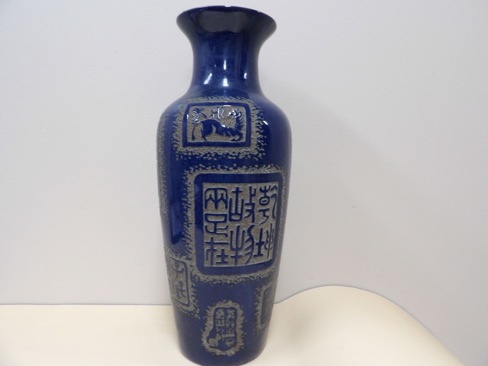 Chinese blue glazed porcelain vase with lots of Chinese calligraphy: 16.4 inches height.