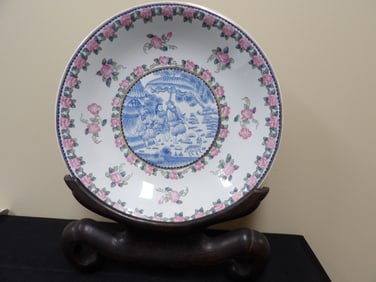 estate large porcelain charger with European subjects and custom wooden base