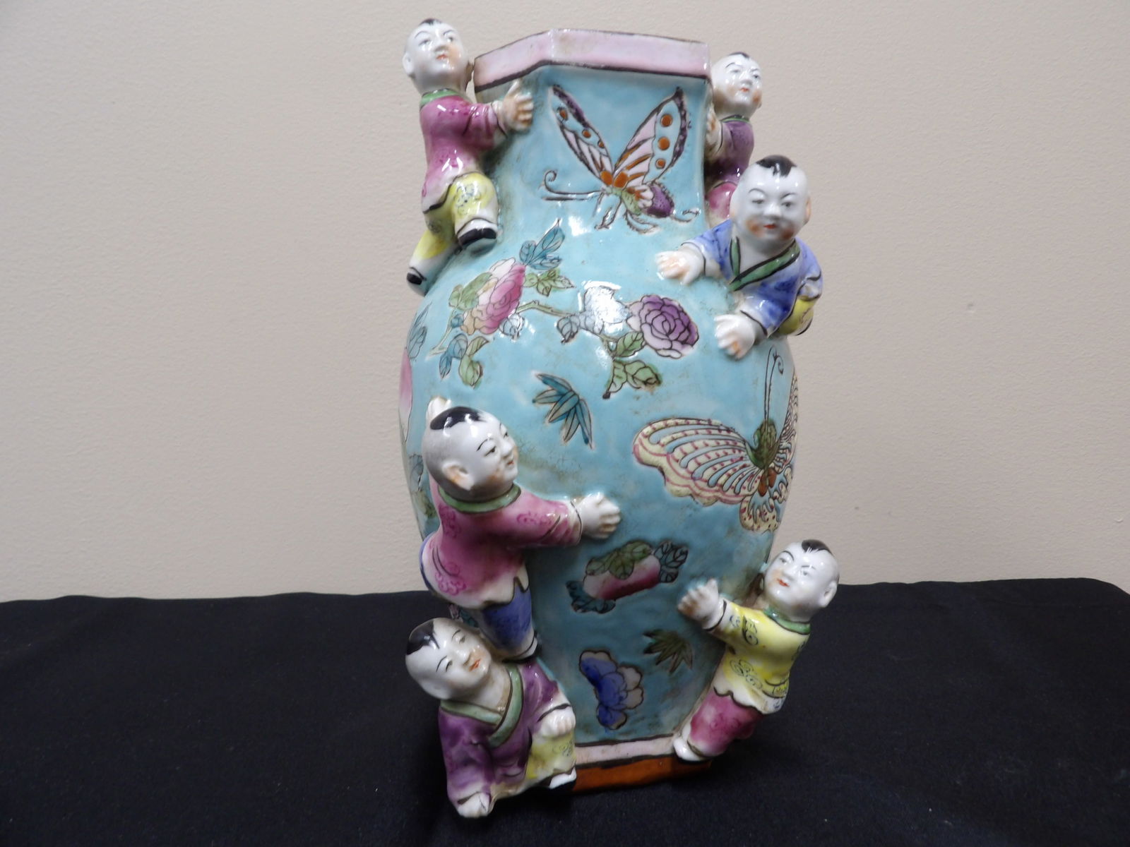 Chinese fertility vase with Qing dynasty Jiajing mark and boys climbing scene: Approx. 10 inches height.