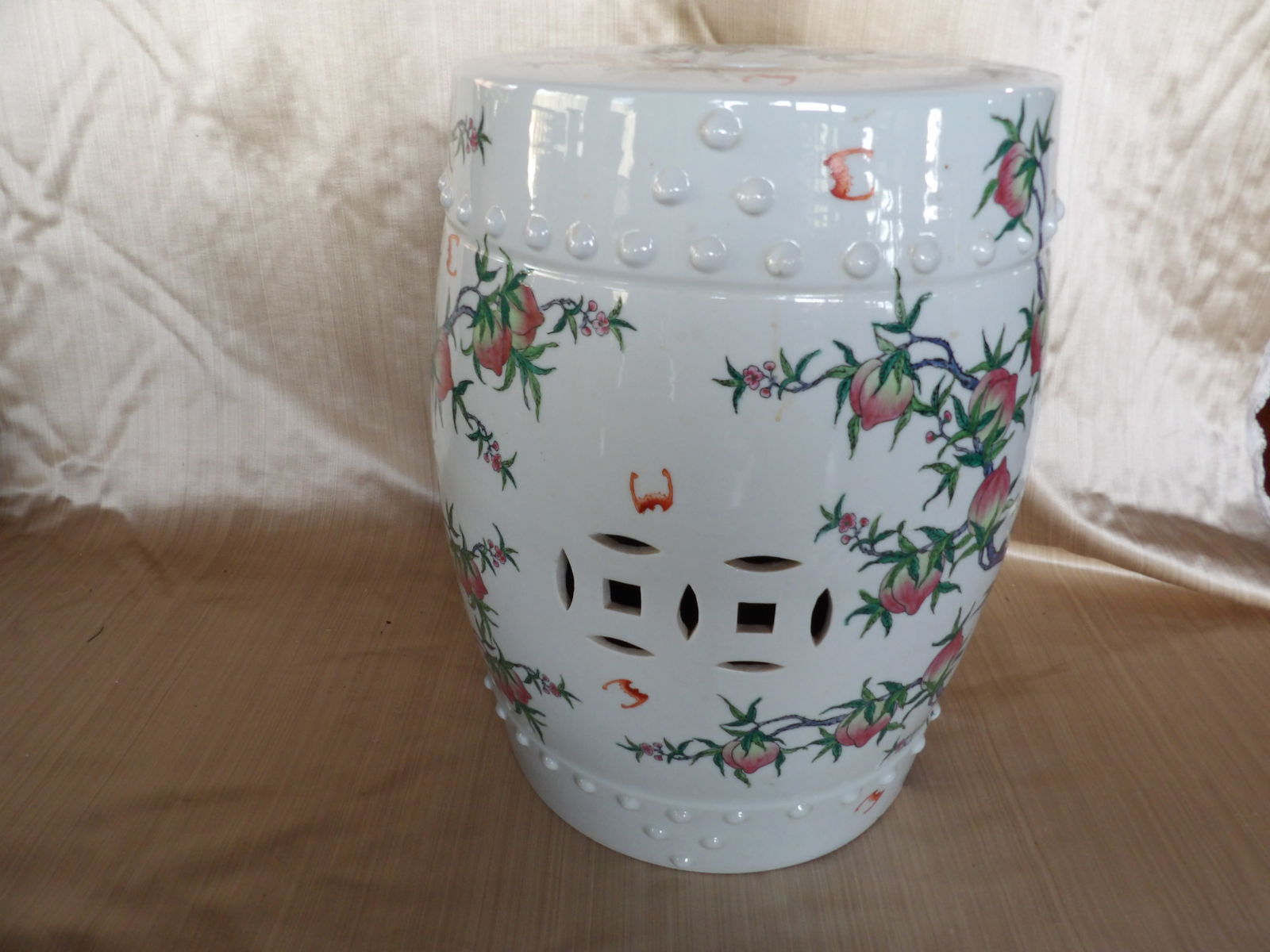 Chinese porcelain garden stool with peaches and Qing dynasty Qianlong mark: 18 inches height.