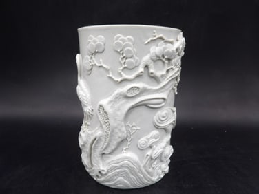 Chinese porcelain brush holder with raised intricate relief Qing dynasty Qianlong mark