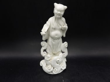 Chinese Dehua porcelain immortal figurine standing on clouds