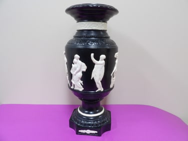 black wedgwood Jasperware urn with white relief "Dancing Hours" figures