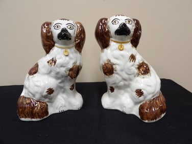 pair of antique Staffordshire spaniel ceramic dog figurines