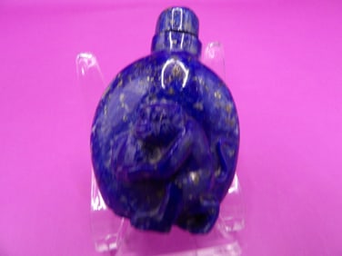 antique Chinese lapis lazuli carved snuff bottle with raised monkey motif