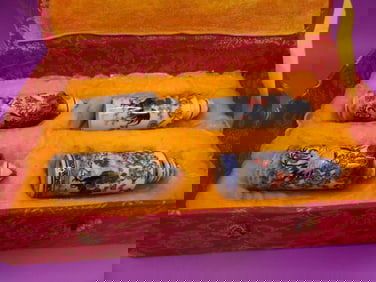 lot of 4 hand painted Chinese porcelain snuff bottles in a padded box