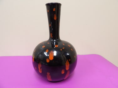 Chinese ceramic vase with black background and orange-red speckles