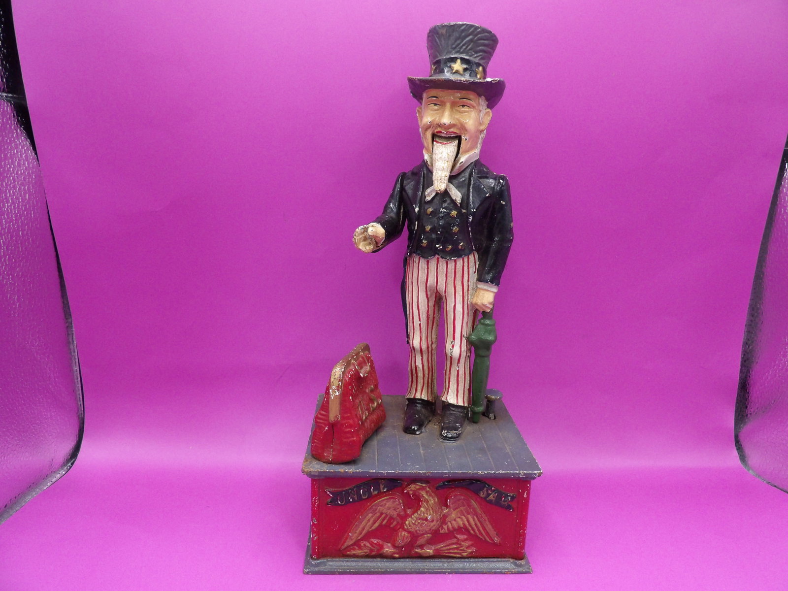 Uncle Sam's cast iron mechanical coin bank with US bag inscription (1 of 7)