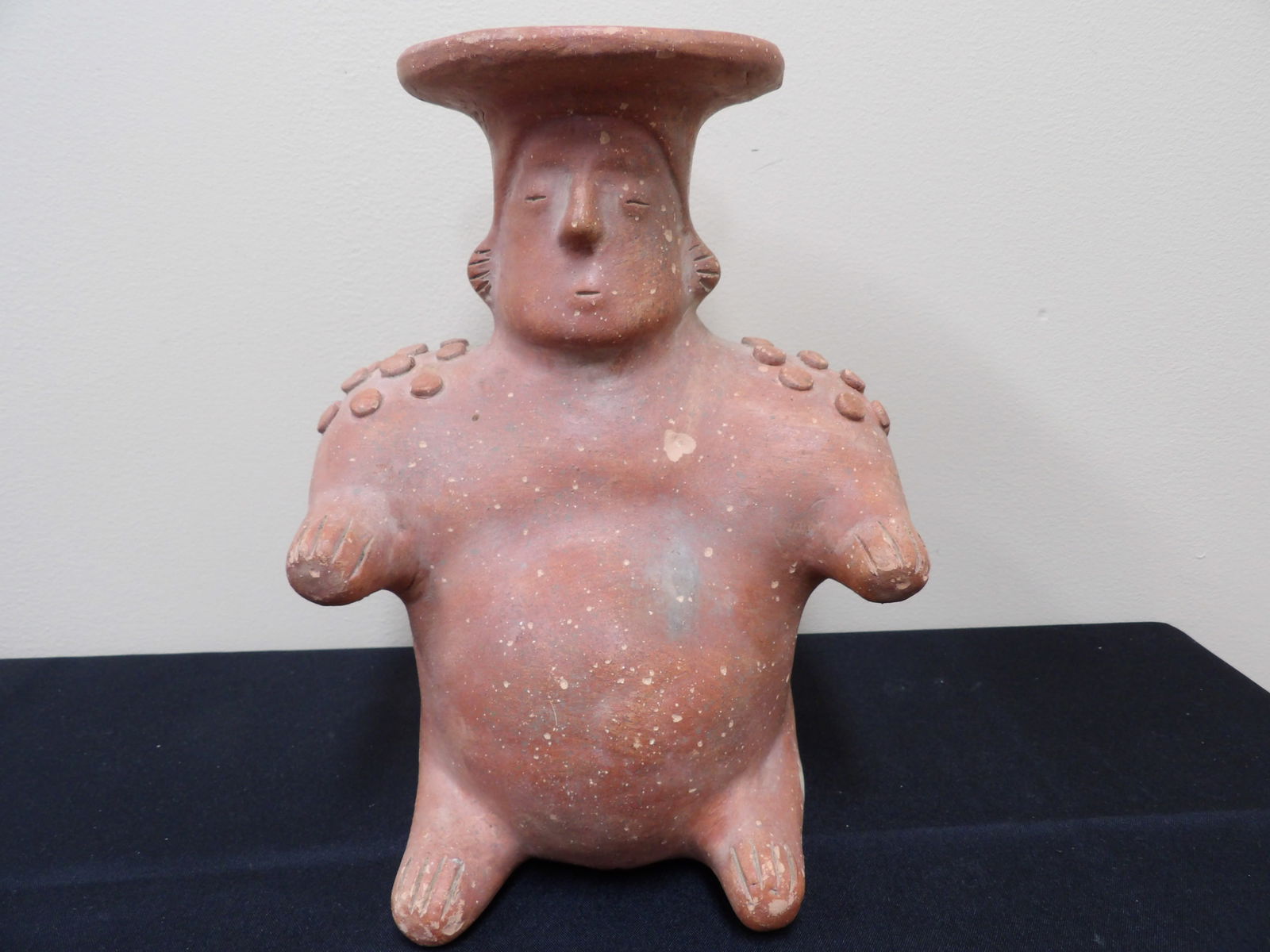 native American pottery seated male figural jug (1 of 7)
