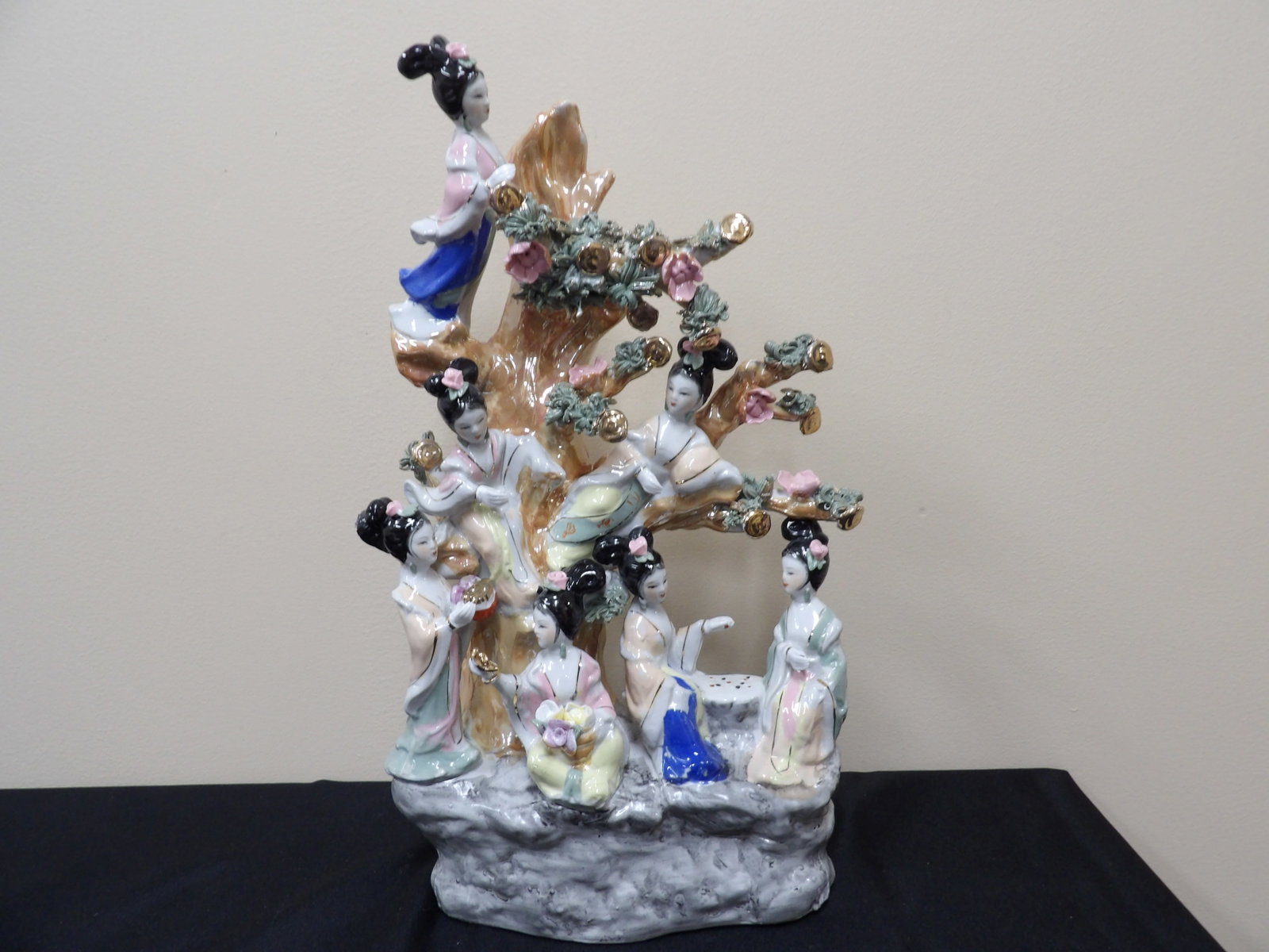 large Chinese porcelain sculpture depicting 7 goddesses surrounded by money tree: 16 inches height.