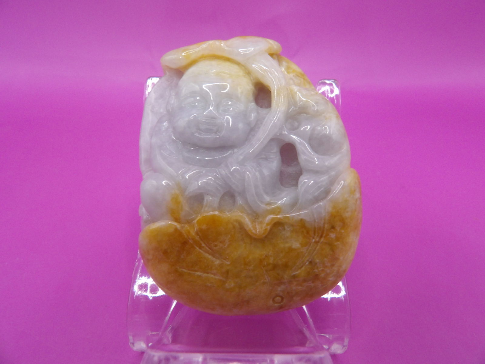 Chinese jadeite jade carved boy holding lotus leaf pendant: 2 inches height. 53 grams.