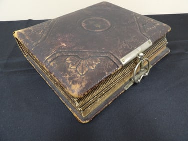 Antique photo album with 54 black and white pictures