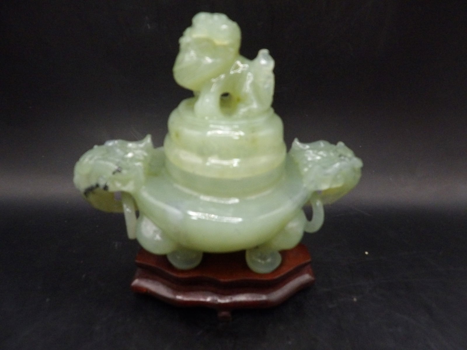 Chinese carved jade incense burner with foo dog lid and rings on wooden base (1 of 7)