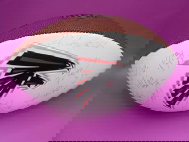 rare autographed NFL football with Atlanta Falcons logo