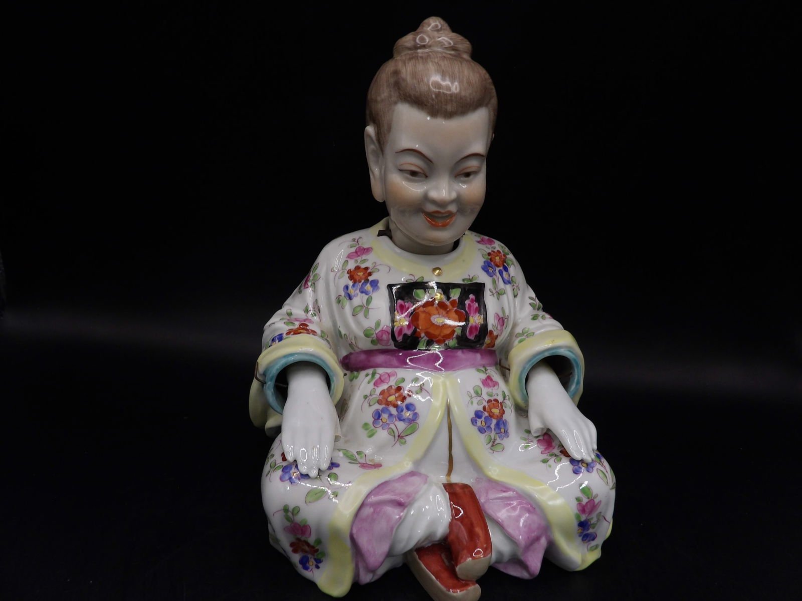 Dresden porcelain nodder: Size is 5.8 x 6 x 7.2 inches. Head nodding function intact but hands don't move up and down. Thumbs are missing.