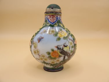 Chinese copper enamel snuff bottle with birds and flowers motif and Qing dynasty Qianlong mark