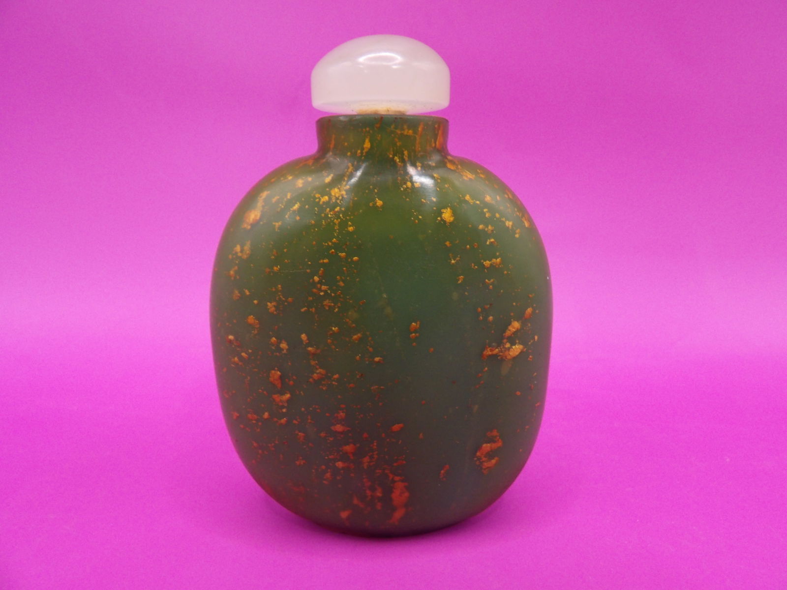 antique Chinese gold speckled green glass snuff bottle: 2.5 inches height.