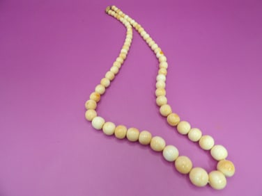 angel skin coral graduated beaded necklace with 14k gold clasp marked