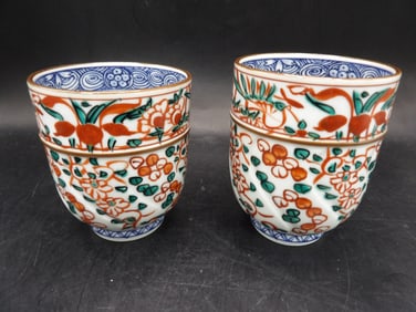 lot of 2 Japanese Kiyomizu ware tea cups with flower motif signed