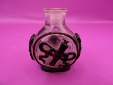 Chinese overlay glass snuff bottle with mask handles