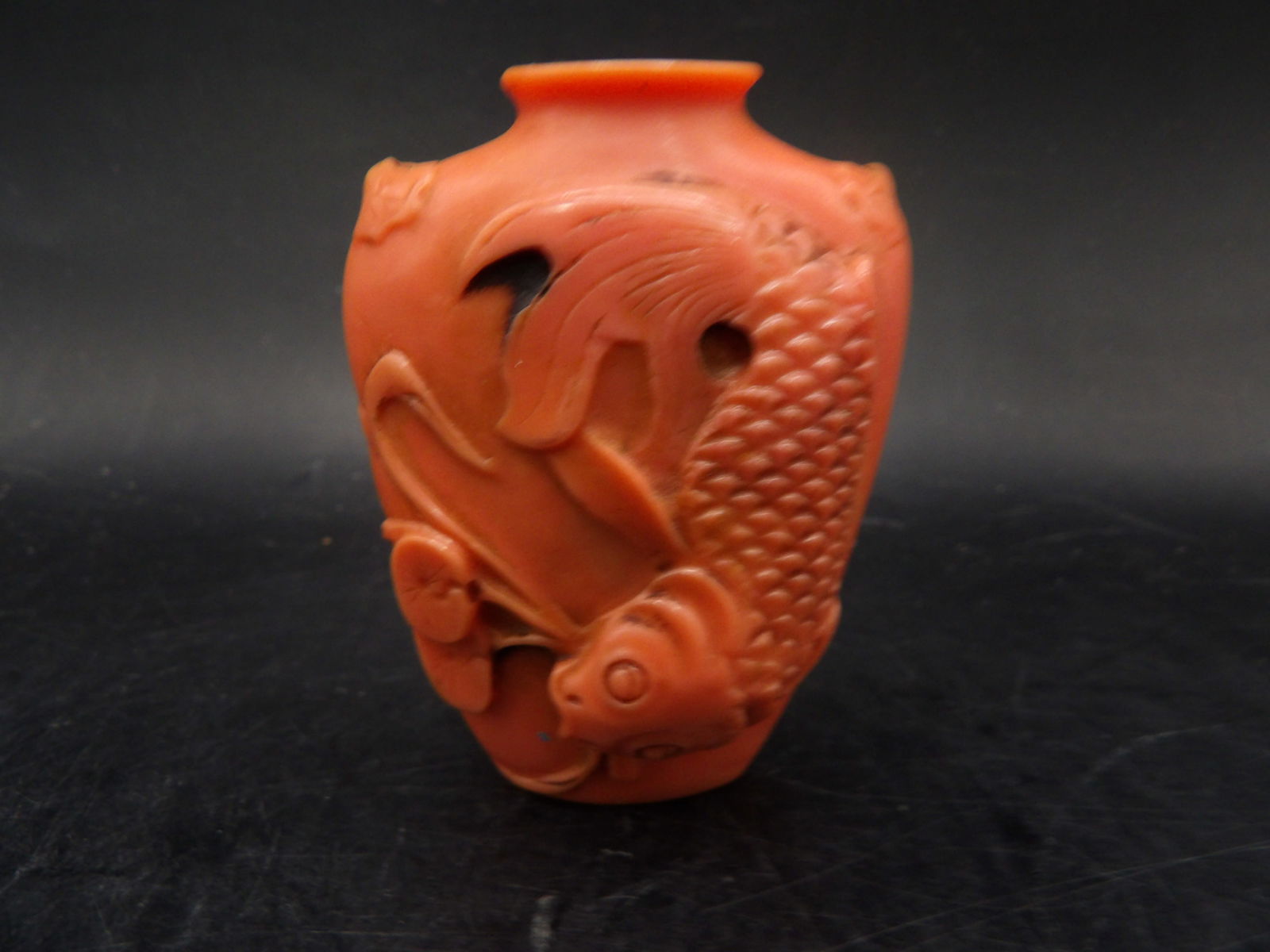 Chinese snuff bottle with fish motif and Chinese calligraphy: Chinese calligraphy on the back of this snuff bottle. 2.6 inches height.