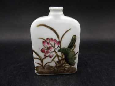 Chinese porcelain snuff bottle with hand painted lotus and Gu Yue Xuan mark