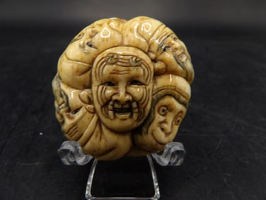 rare antique Japanese bone carved with 9 expressive faces Edo/Meiji period