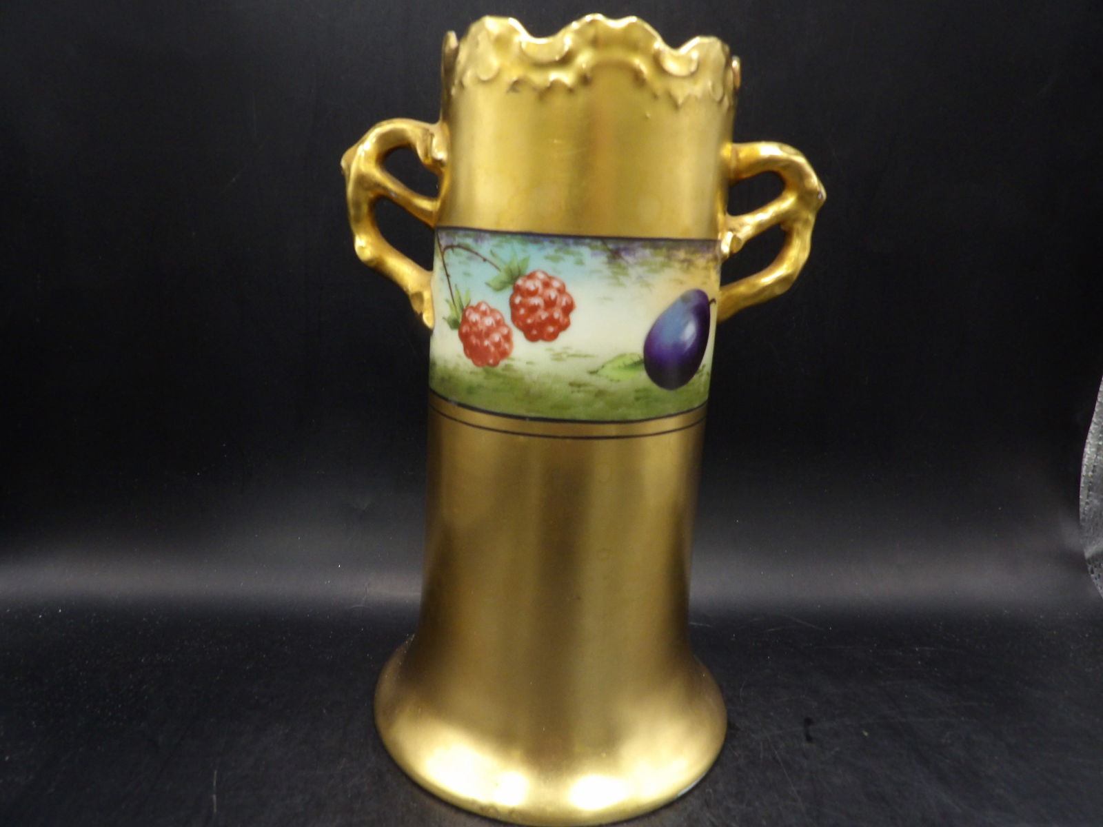 European gold gilt porcelain vase with hand painted fruits and ornate handles circa 1900: 8 inches height.