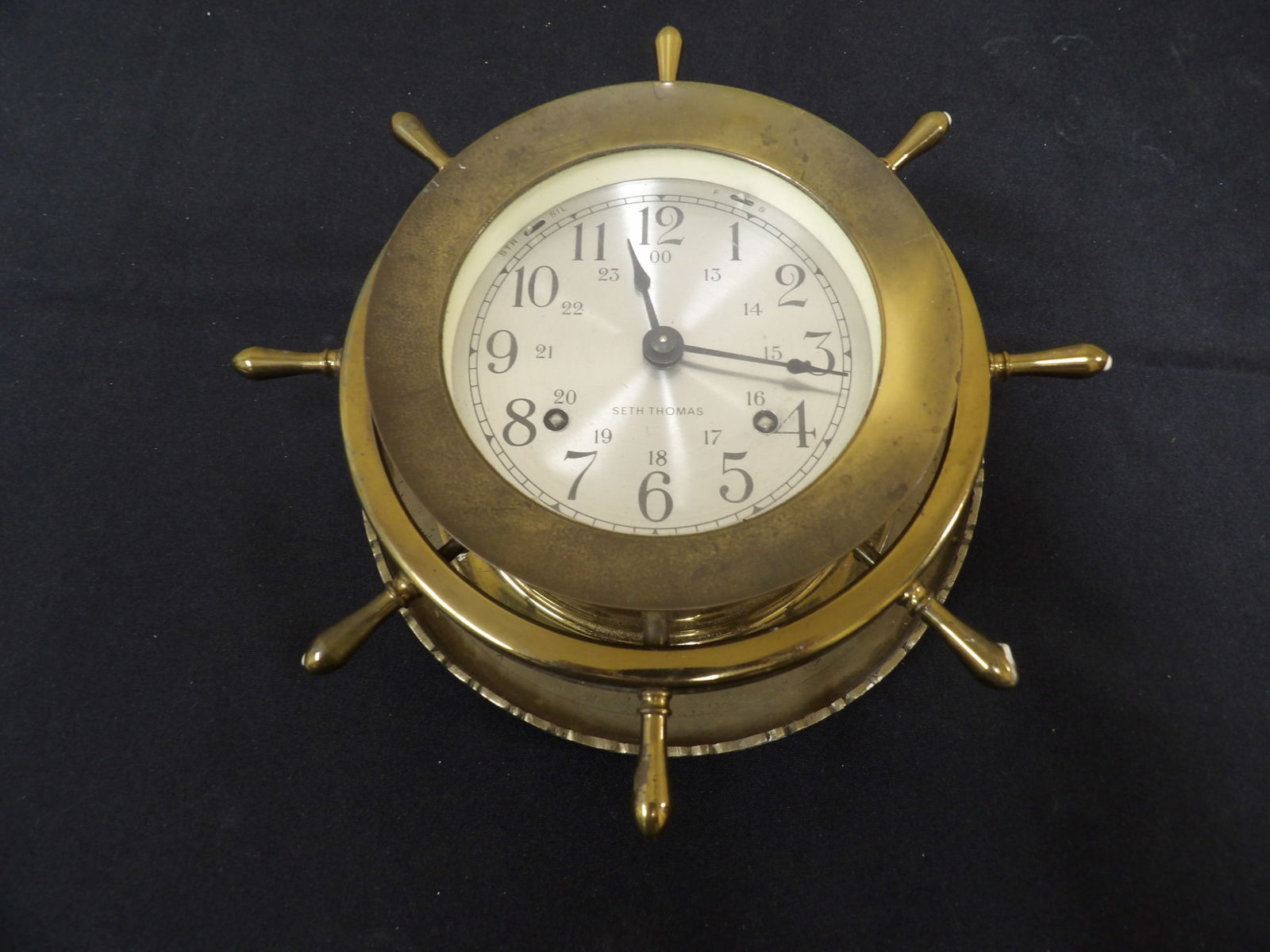 Seth Thomas brass ship's wheel clock with a 24-hour dial (1 of 4)