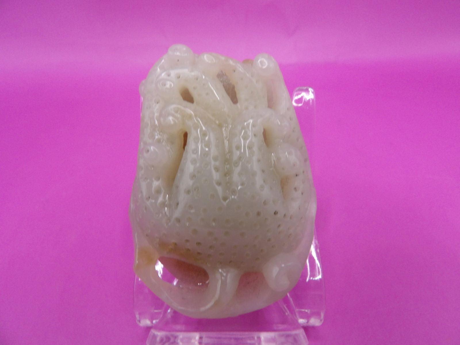 Chinese jade double sided carving of buddha's hand and coins: 2 inches height. 59 grams.