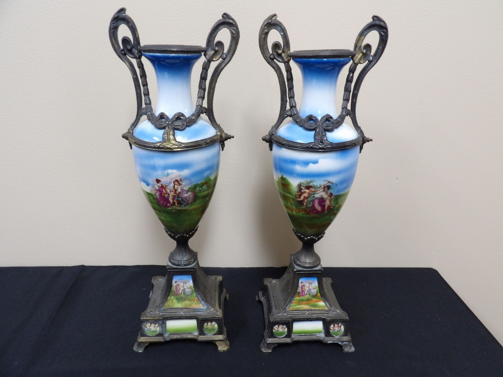 Antique pair of hand painted French porcelain and mixed metal amphora vases: 15.5 inches height.
