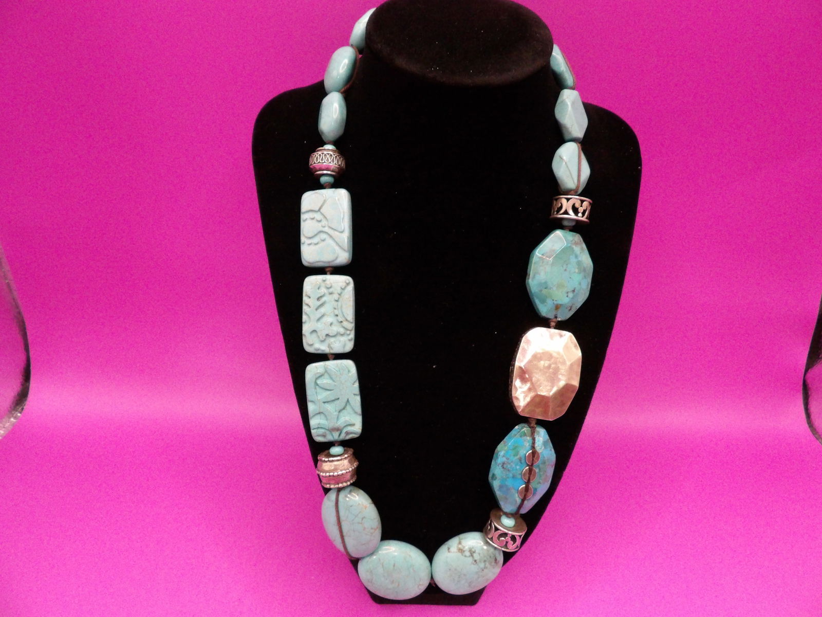 Carved turquoise beads and hammered silver necklace: 23 inches long. 156 grams.