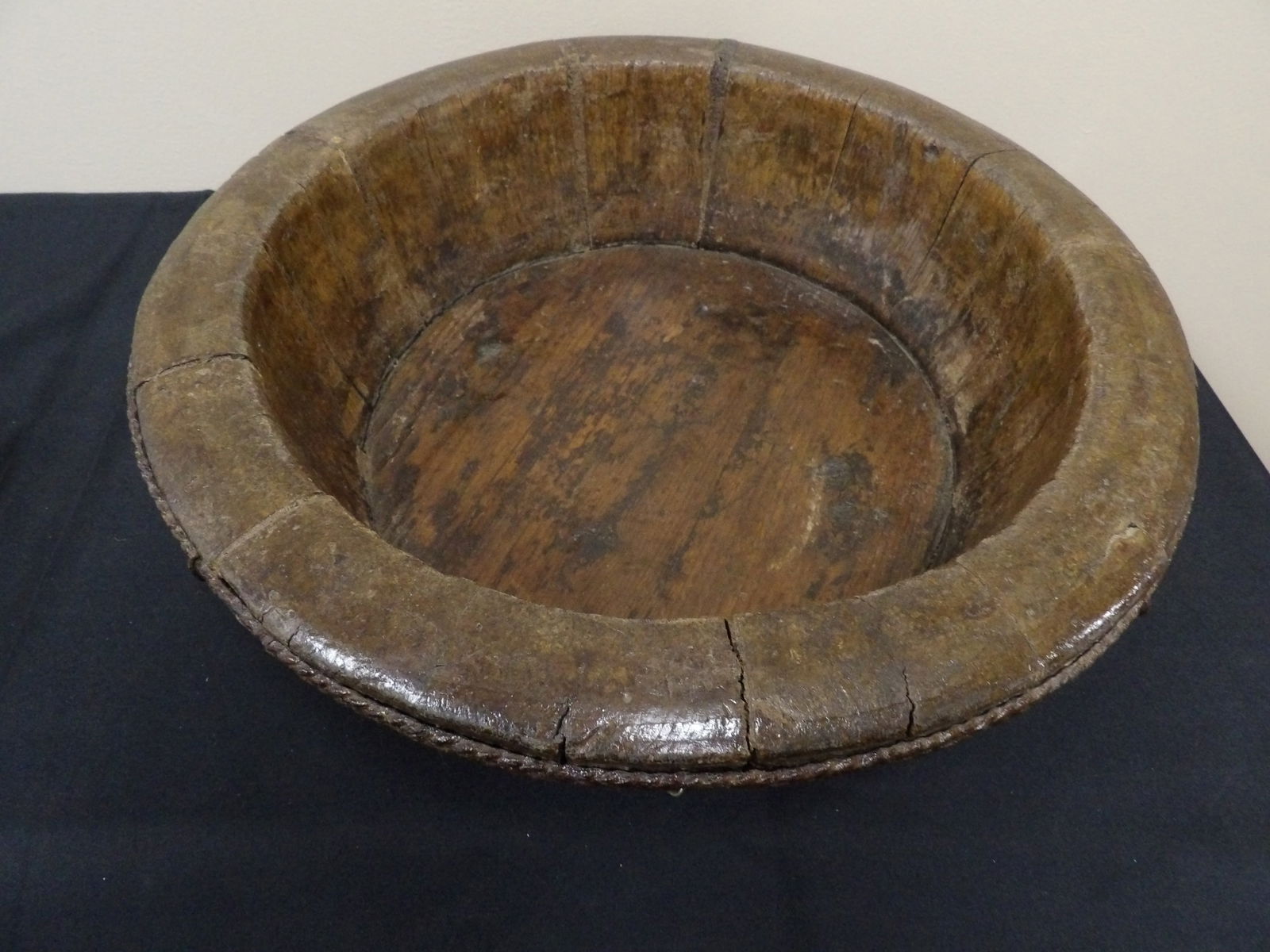 Antique Chinese braided iron banded wooden grain large bowl: 17 inches opening.