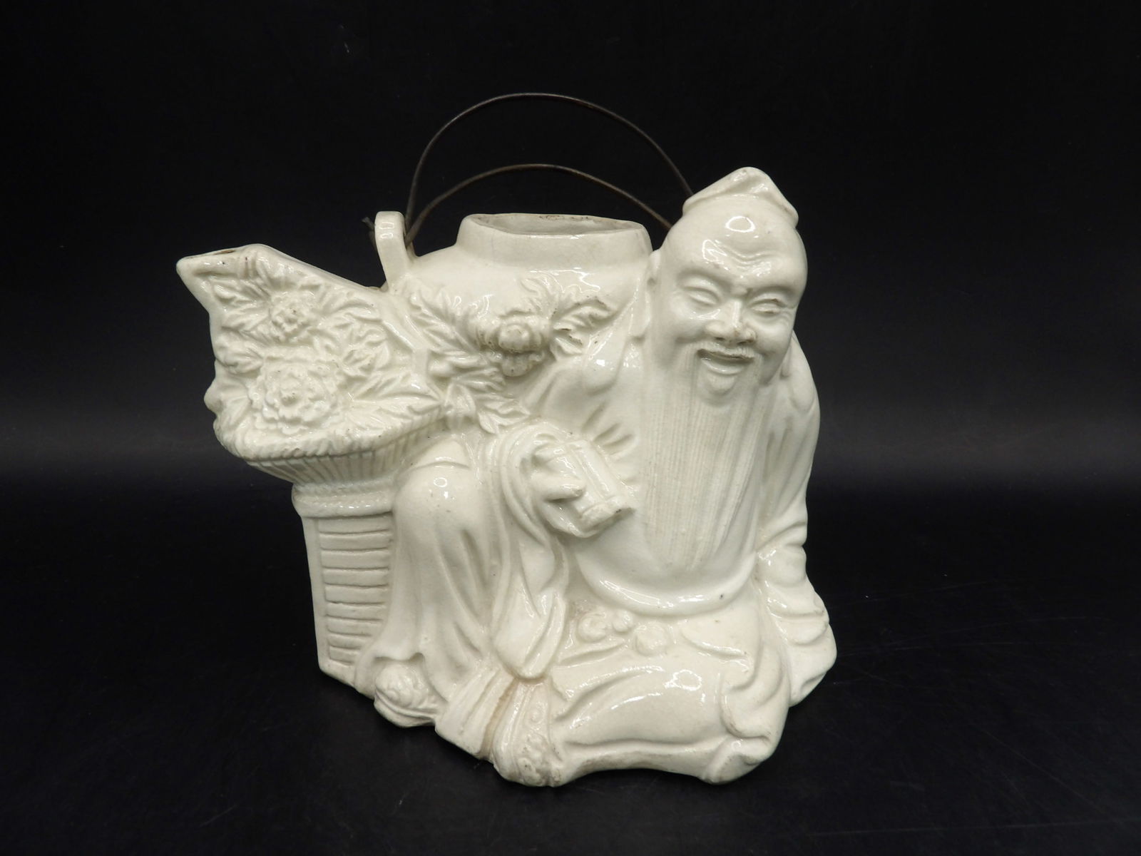 Rare Asian Blanc de China figural teapot signed on the bottom: Size is 5.5 x 4 x 4.2 inches. No lid.