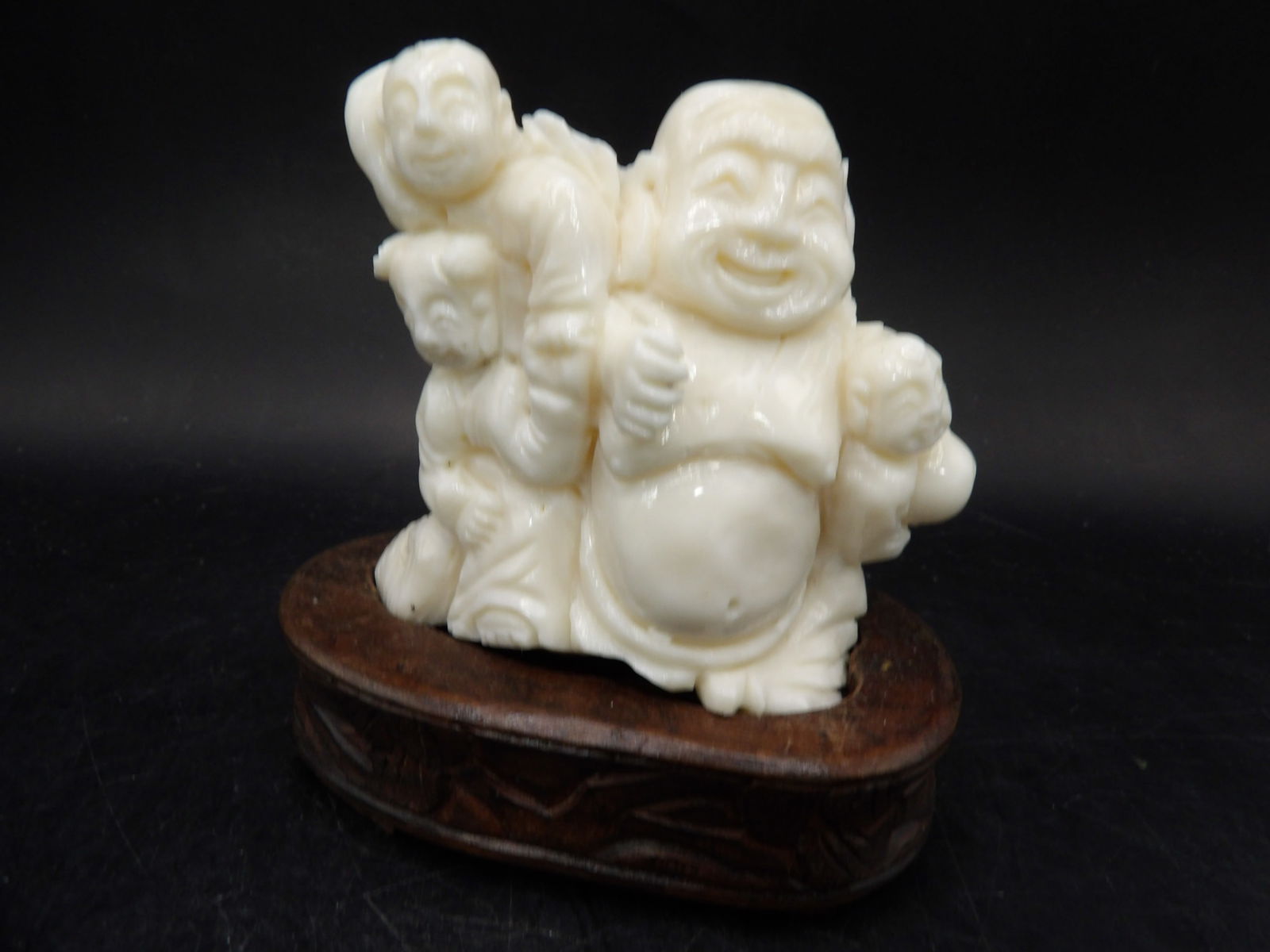 rare Chinese coral fine carved buddha and 3 boys group sculpture adhered on wooden base: 3.3 inches height including wooden base.