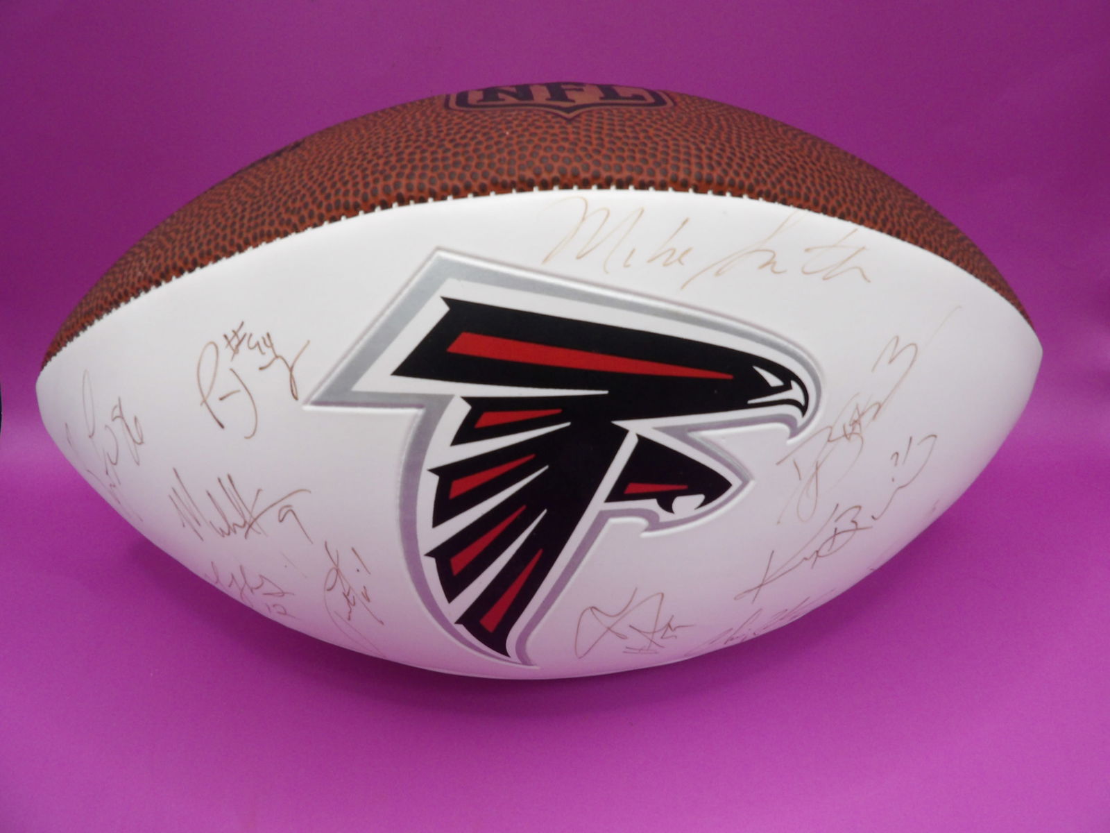 rare autographed NFL football with Atlanta Falcons logo: Approx. 11 inches length. From Atlanta estate.