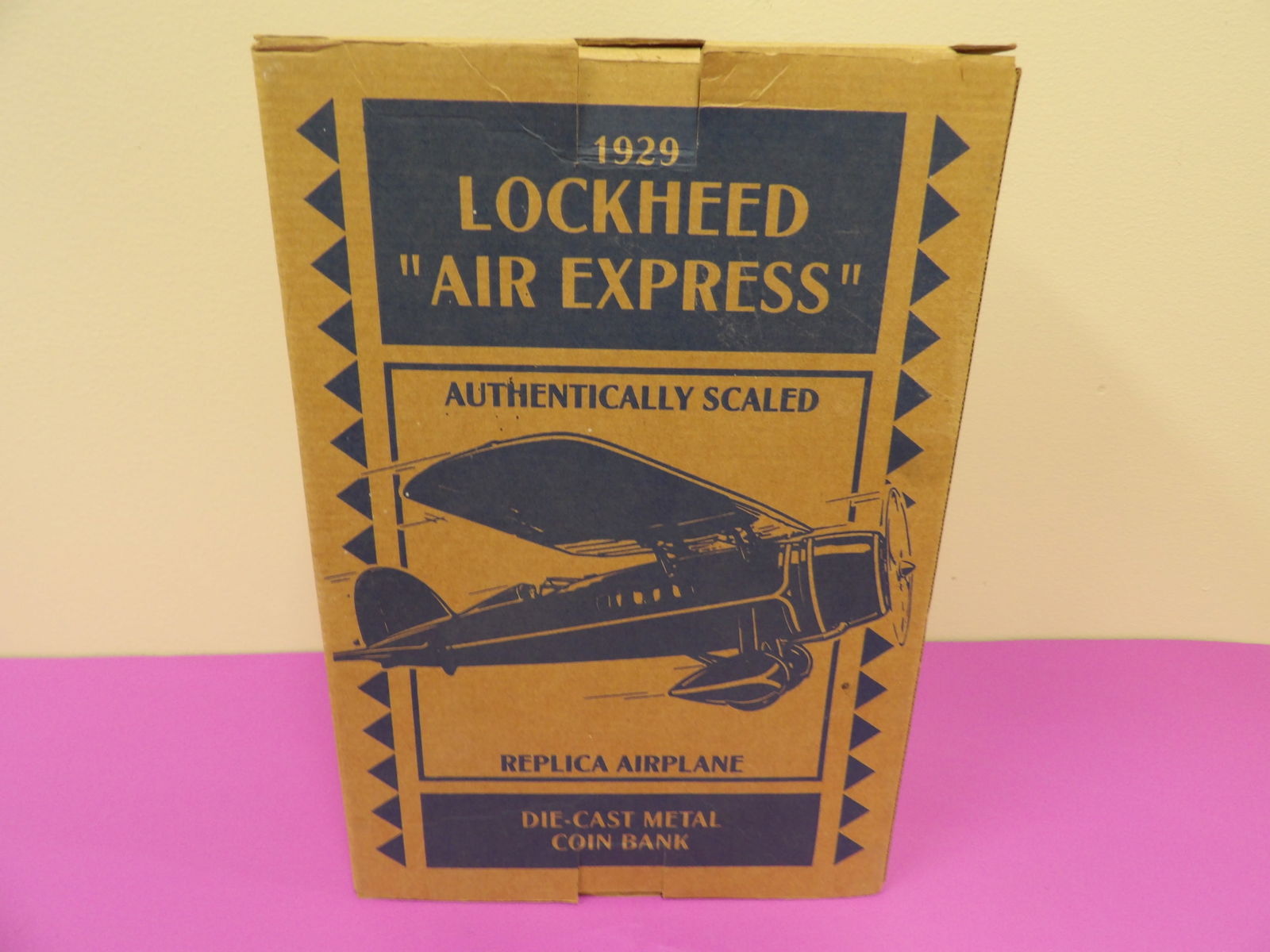 1929 lockheed air express die cast metal coin bank: 12.5 inches height box.