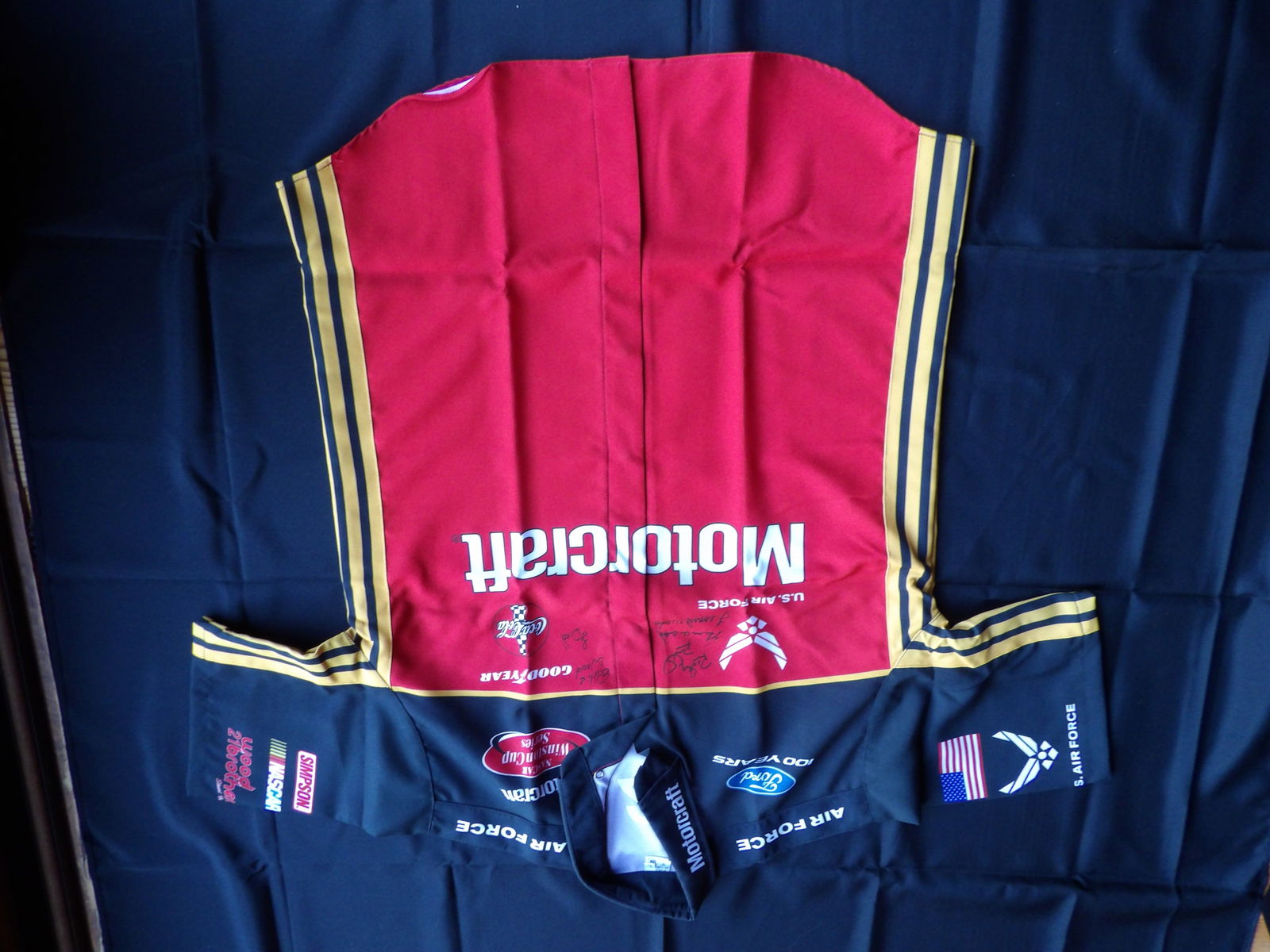 Rare RICKY RUDD, WOODS BROTHERS. Motorcraft Size L Shirt With 5 Signatures: RICKY RUDD, WOODS BROTHERS. Five signatures on the front of the shirt.