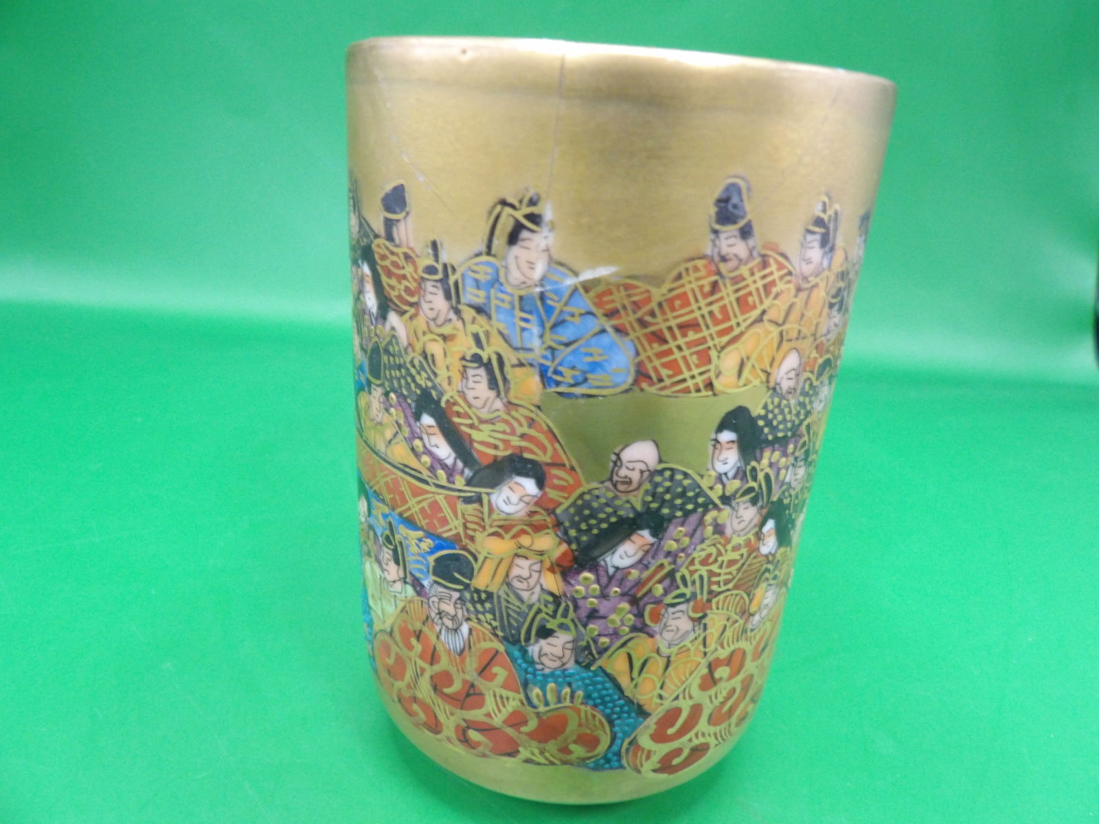 antique hand painted Japanese Kutani ware cup with lots of calligraphy inside signed: Meiji period. 3.7 inches height.
