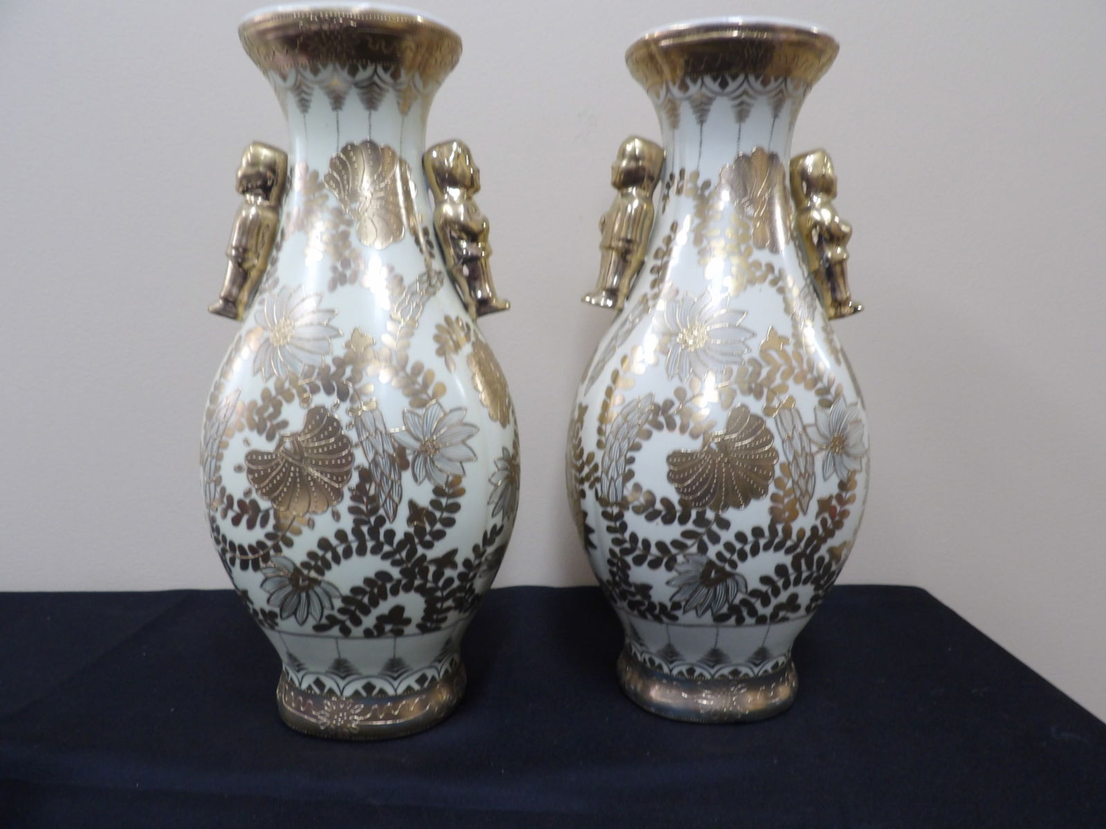 pair of antique Nippon porcelain vases with gold moriage and figural handles Meiji period: Approx. 15 inches height.