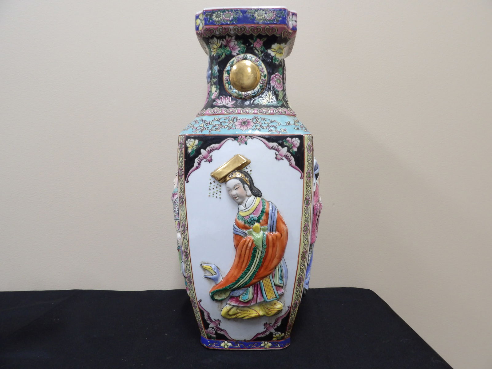 Chinese porcelain vase with 4 raised figures and floral enamels (1 of 10)