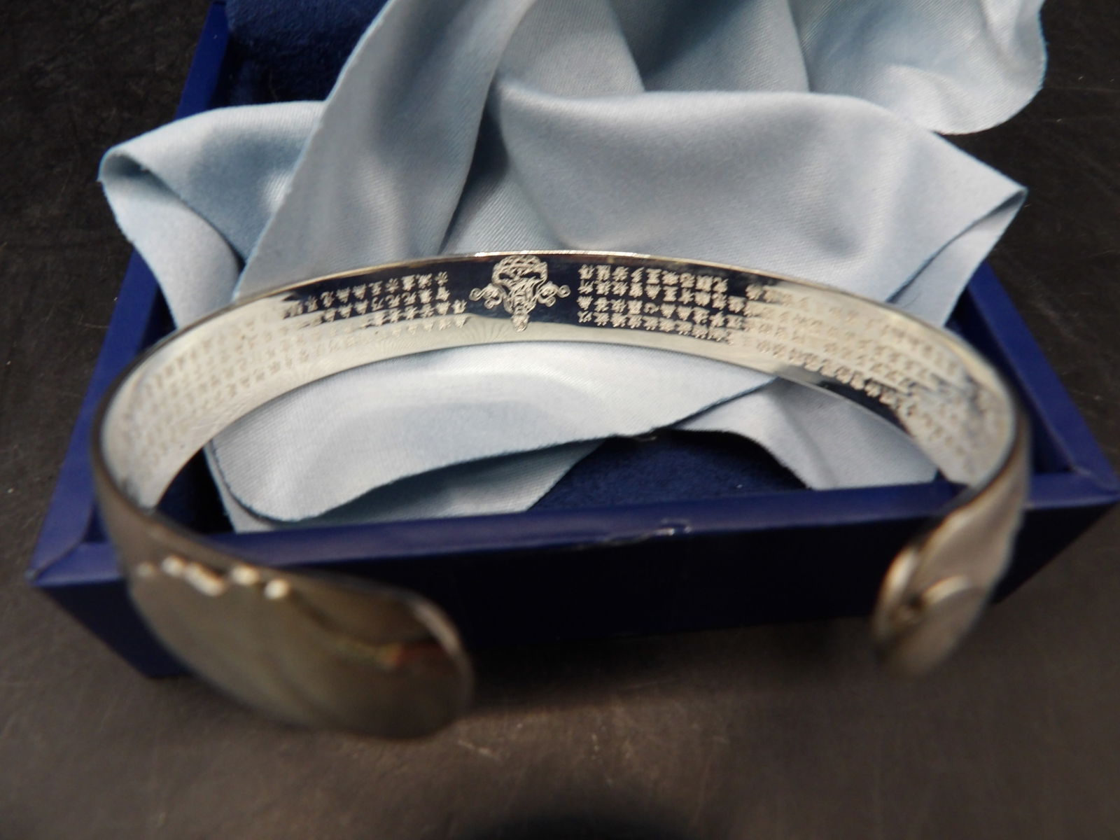 rare 999 pure silver cuff bracelet with engraved Buddhist Heart Sutra marked 30 grams: Engraved with lots of words from Buddhist Heart Sutra in Chinese. Marked 999 and 30 grams. Fit 7 to 7.5 inches wrist.
