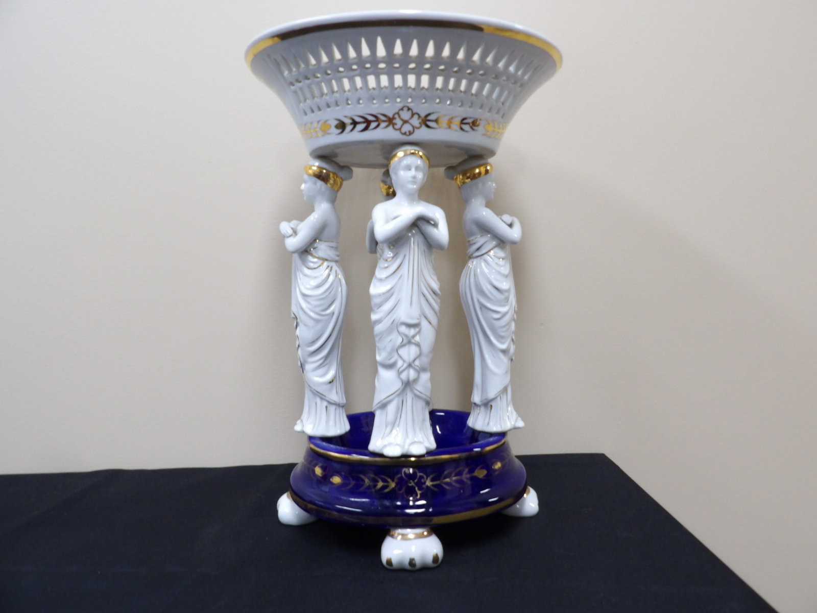 rare antique 19th century French porcelain centerpiece with draped figures: 17 inches height.