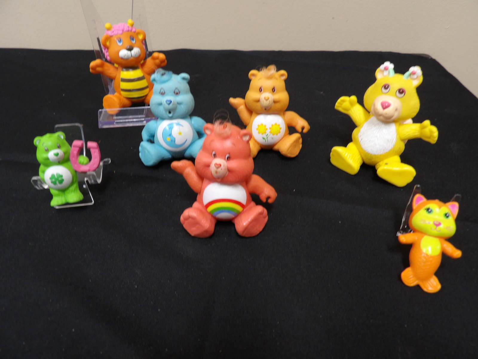 lot of 7 vintage pvc toys including 4 care bears: The tallest one is about 4 inches height.