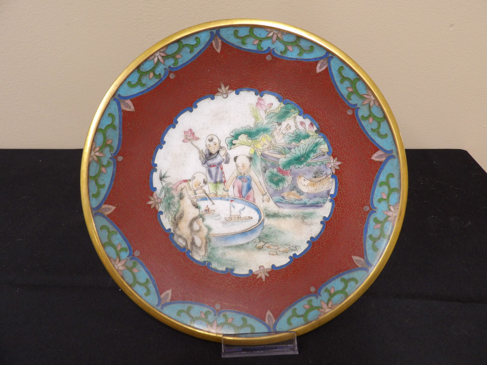antique fine Chinese cloisonne plate with children playing scene: 10 inches diameter.